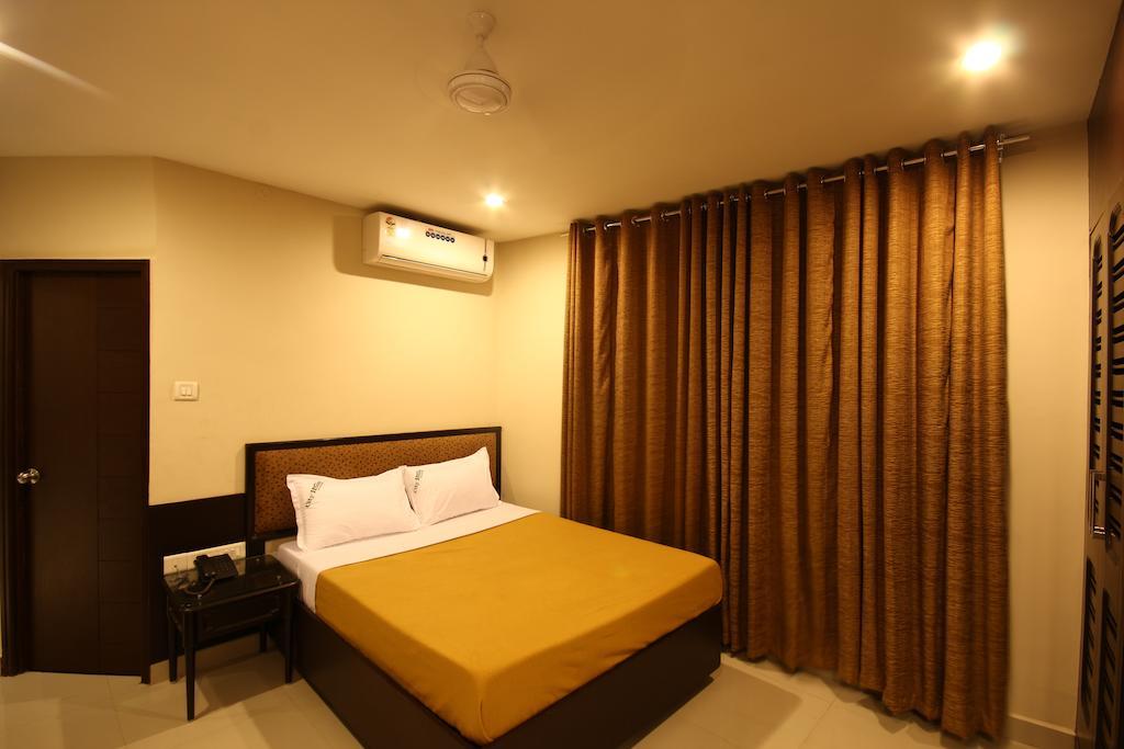 City Home Chennai Værelse billede